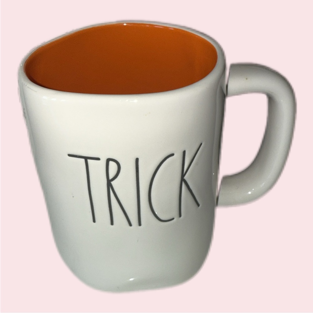 Cream and Orange Ceramic Mug with 'TRICK' Design RAE DUNN